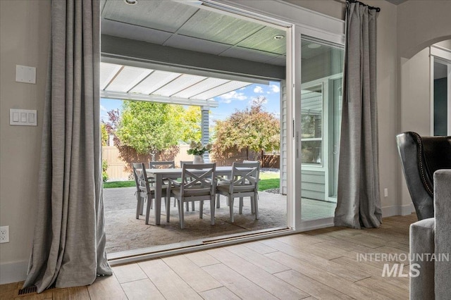2357 N Synergy Pl, Eagle, ID 83616 - doorway to outside featuring wood finished floors and arched walkways