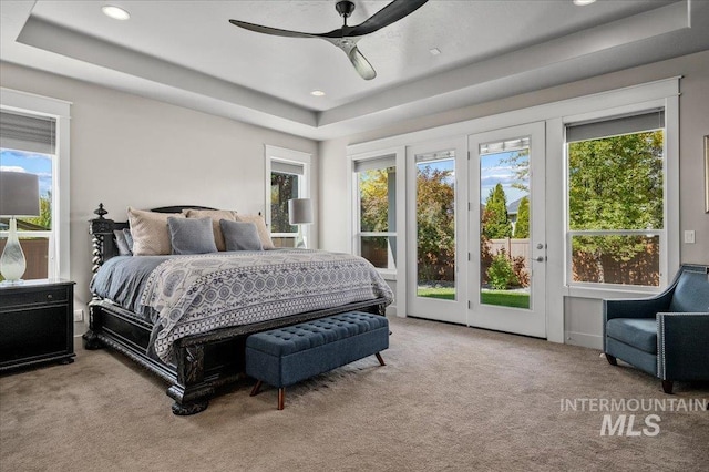 2357 N Synergy Pl, Eagle, ID 83616 - bedroom with access to exterior, multiple windows, a raised ceiling, carpet flooring, and recessed lighting
