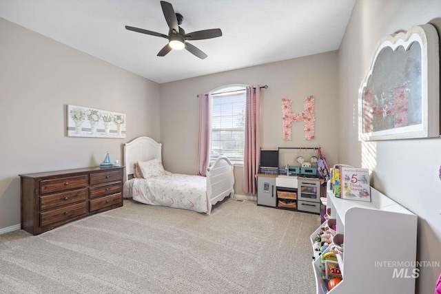 bedroom with ceiling fan and light colored carpet