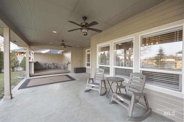 view of patio with ceiling fan