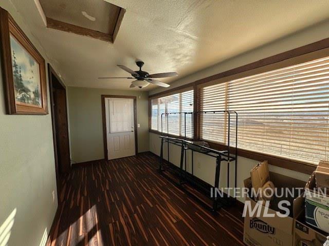 interior space featuring a textured ceiling