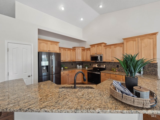 1415 E Lake Crk, Meridian, ID 83642 - kitchen with stainless steel appliances, a sink, tasteful backsplash, light stone countertops, and high vaulted ceiling