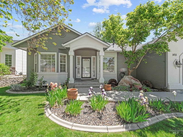 1415 E Lake Crk, Meridian, ID 83642 - ranch-style home featuring a front lawn