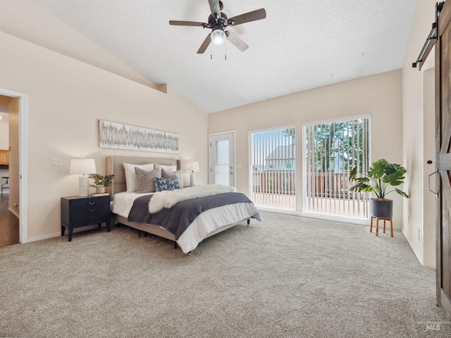 1415 E Lake Crk, Meridian, ID 83642 - bedroom featuring a barn door, carpet floors, lofted ceiling, ceiling fan, and a textured ceiling