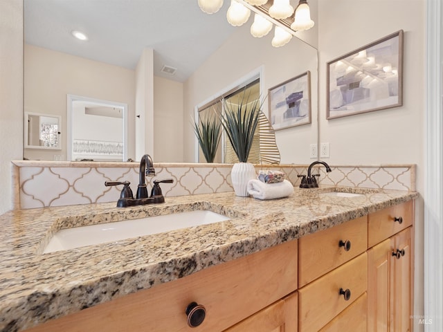 1415 E Lake Crk, Meridian, ID 83642 - full bath featuring double vanity and a chandelier