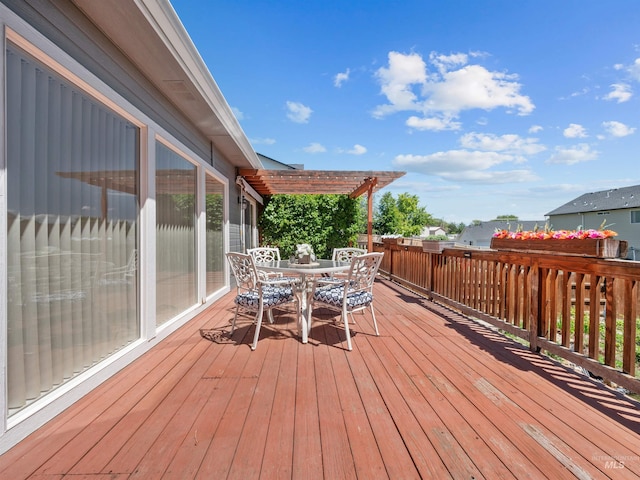 1415 E Lake Crk, Meridian, ID 83642 - wooden terrace with outdoor dining area and a pergola