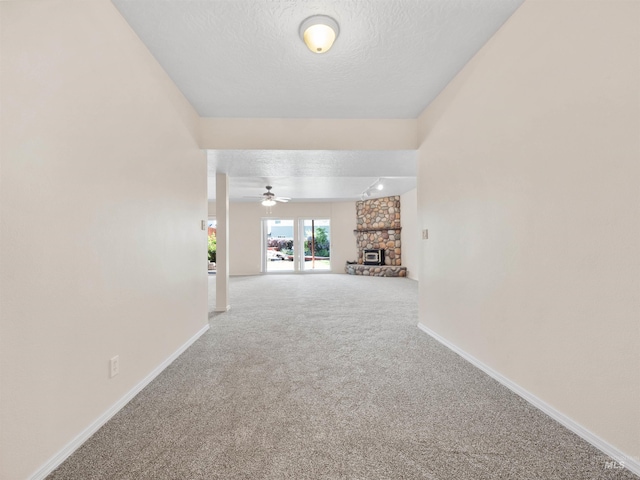 1415 E Lake Crk, Meridian, ID 83642 - hall with carpet, a textured ceiling, and baseboards