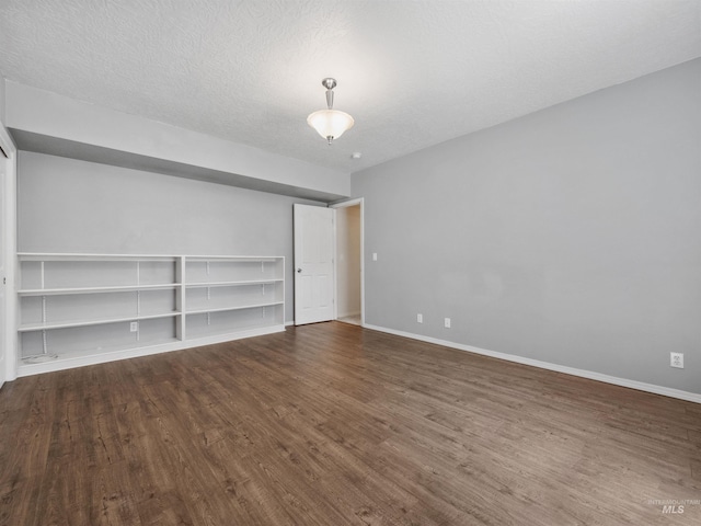 1415 E Lake Crk, Meridian, ID 83642 - spare room featuring dark wood finished floors and baseboards