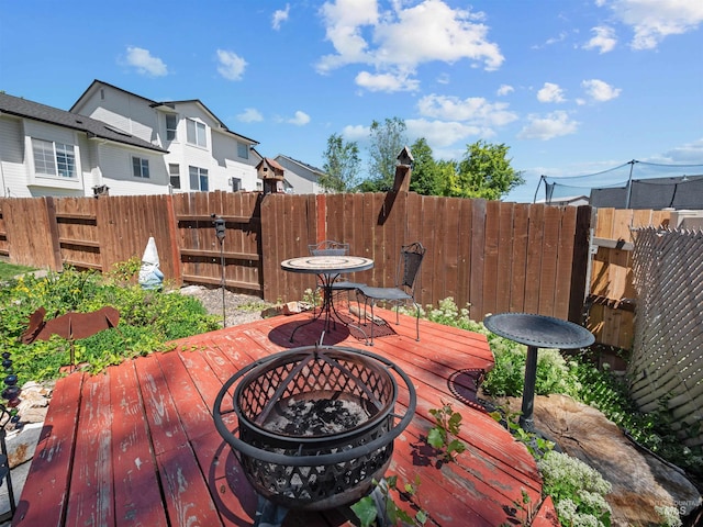 1415 E Lake Crk, Meridian, ID 83642 - wooden deck with an outdoor fire pit and a residential view