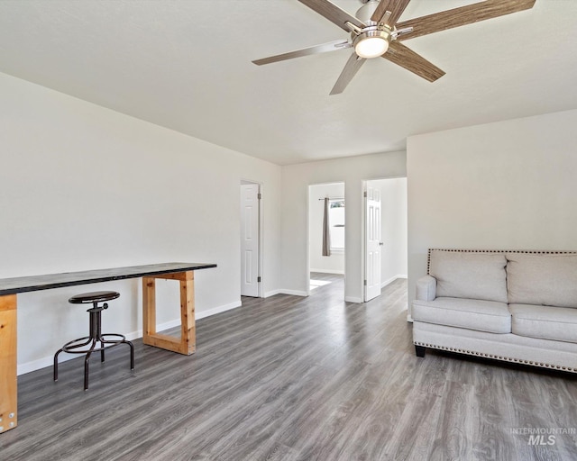 504 E 7th St, Emmett, ID 83617 - living room with wood finished floors, baseboards, and ceiling fan