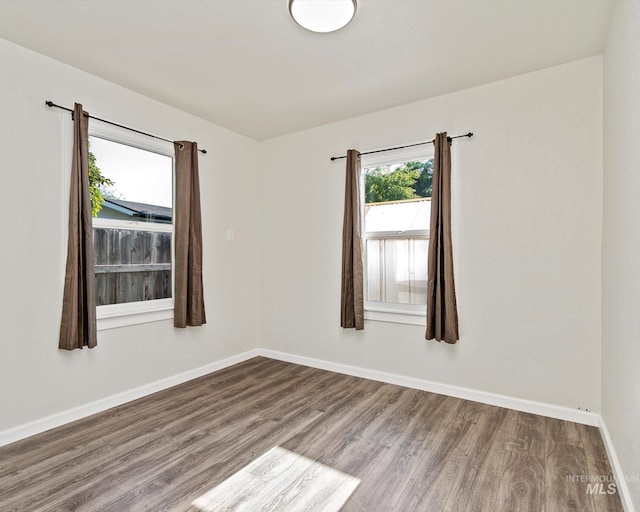 504 E 7th St, Emmett, ID 83617 - unfurnished room with wood finished floors and baseboards
