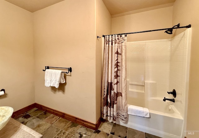 20 Shore Crest Ct, Donnelly, ID 83615 - bathroom with baseboards and shower / tub combo with curtain