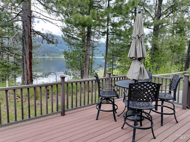 20 Shore Crest Ct, Donnelly, ID 83615 - wooden deck with a water view and outdoor dining space