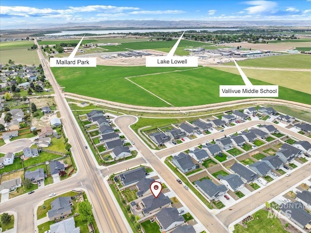 view of property location featuring nearby suburban area