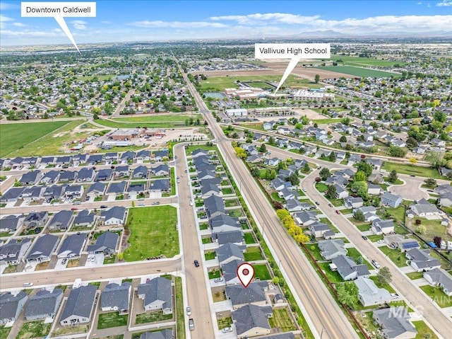 aerial overview of property's location with nearby suburban area