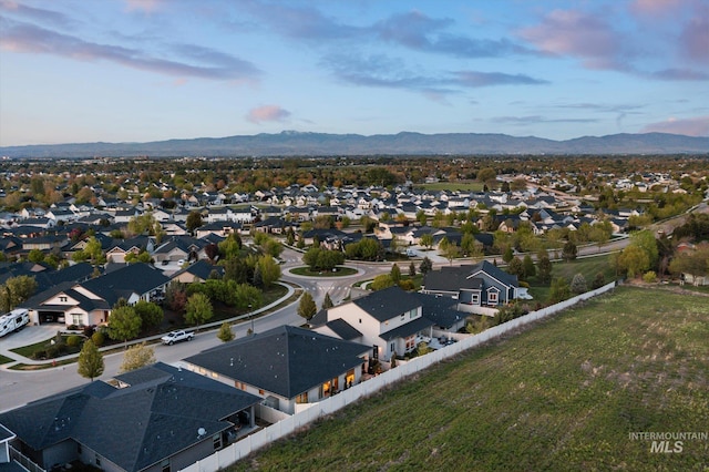 birds eye view of property with a residential view and a mountain view
