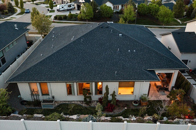 birds eye view of property with a residential view