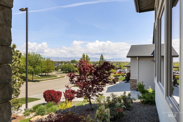exterior space featuring a mountain view