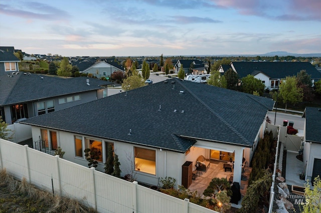 aerial view at dusk with a residential view