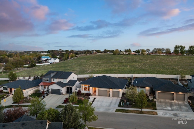 aerial view at dusk with a residential view