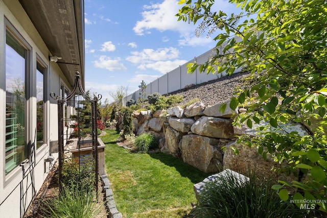 view of yard featuring fence