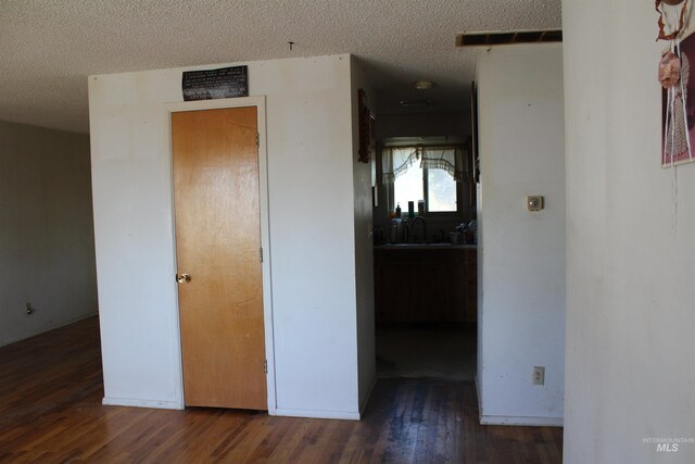 bathroom featuring vanity, toilet, and a shower with door