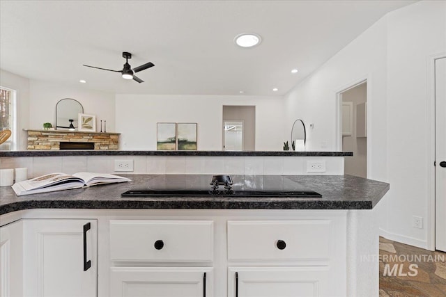 kitchen with white cabinetry, black electric cooktop, recessed lighting, and ceiling fan