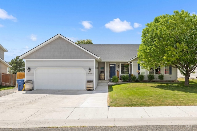 1509 N Cedar St, Jerome, ID 83338 - view of front of property with an attached garage and driveway