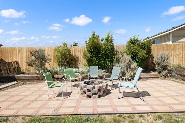 1509 N Cedar St, Jerome, ID 83338 - view of patio with an outdoor fire pit and a fenced backyard