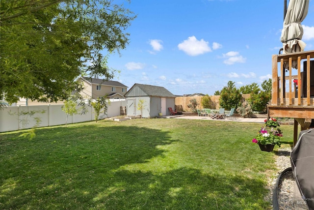 1509 N Cedar St, Jerome, ID 83338 - view of yard featuring a shed, a patio area, and an outdoor structure