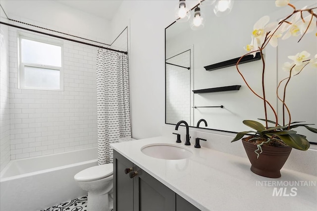 full bath featuring toilet, shower / bath combo, and vanity