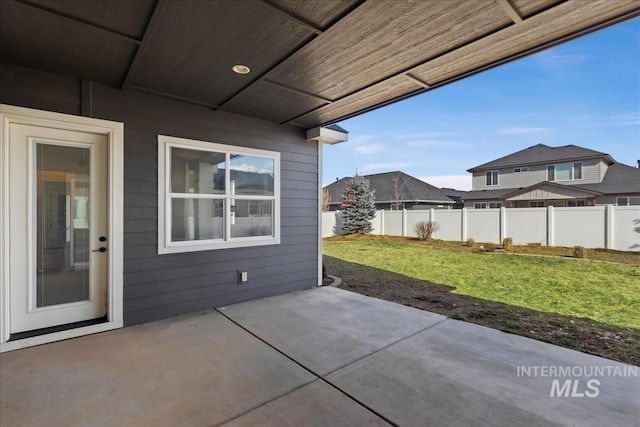 view of patio with fence