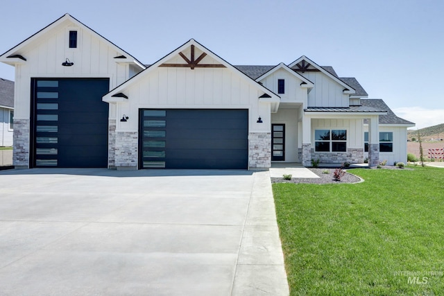 275 Meadow View Dr, Payette, ID 83661 - modern farmhouse style home with board and batten siding, an attached garage, and a standing seam roof