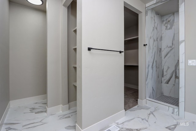 275 Meadow View Dr, Payette, ID 83661 - bathroom with a marble finish shower, a walk in closet, and marble finish flooring