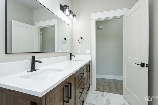 275 Meadow View Dr, Payette, ID 83661 - bathroom featuring double vanity and marble finish flooring