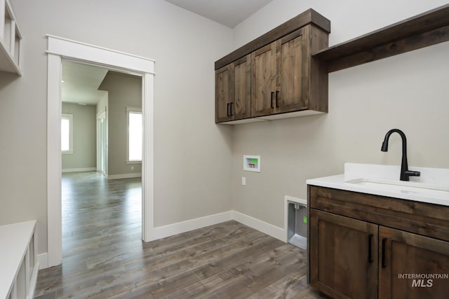 275 Meadow View Dr, Payette, ID 83661 - laundry area featuring hookup for a washing machine, dark wood-style flooring, and cabinet space