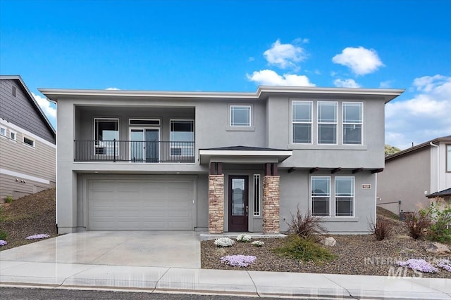 19322 N Shepherds Pie Pl, Boise, ID 83714 - view of front facade featuring a balcony, stucco siding, driveway, stone siding, and an attached garage