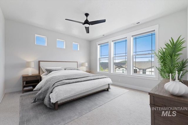 19322 N Shepherds Pie Pl, Boise, ID 83714 - carpeted bedroom with baseboards and a ceiling fan