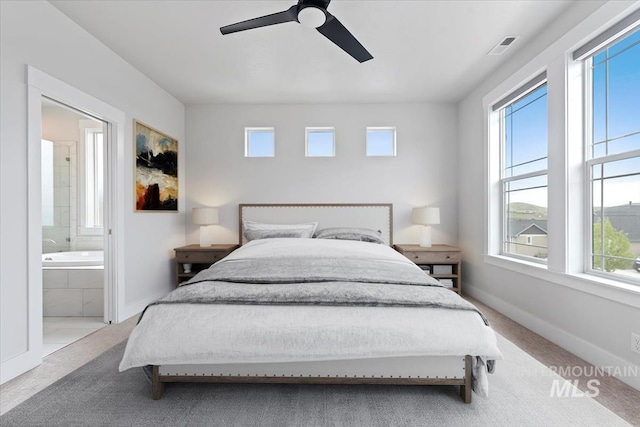 19322 N Shepherds Pie Pl, Boise, ID 83714 - bedroom with multiple windows, carpet flooring, and ensuite bath