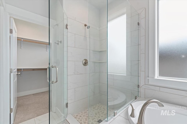 19322 N Shepherds Pie Pl, Boise, ID 83714 - bathroom with a shower stall, a spacious closet, and a tub