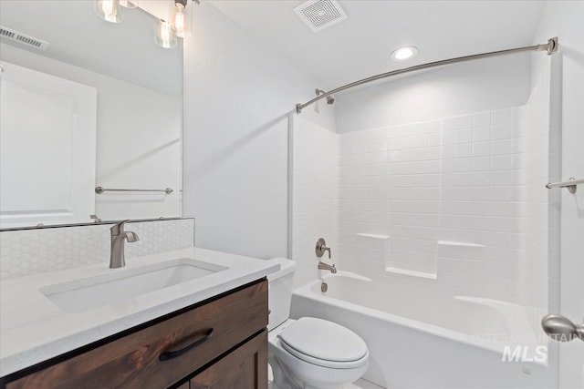 19322 N Shepherds Pie Pl, Boise, ID 83714 - bathroom with toilet, vanity,  shower combination, recessed lighting, and tasteful backsplash