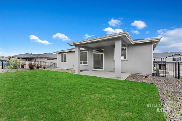 19322 N Shepherds Pie Pl, Boise, ID 83714 - rear view of property featuring stucco siding and a patio