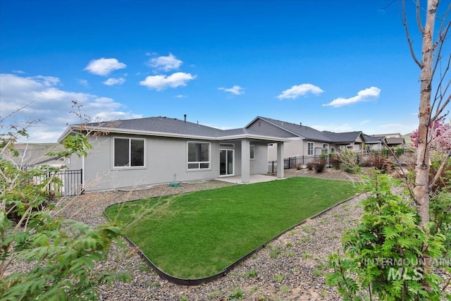 19322 N Shepherds Pie Pl, Boise, ID 83714 - back of property featuring stucco siding, a patio, and a shingled roof