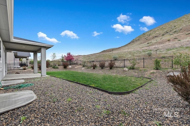 19322 N Shepherds Pie Pl, Boise, ID 83714 - fenced backyard featuring a patio and a mountain view