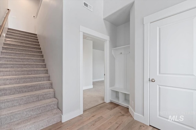 19322 N Shepherds Pie Pl, Boise, ID 83714 - staircase featuring wood finished floors and baseboards