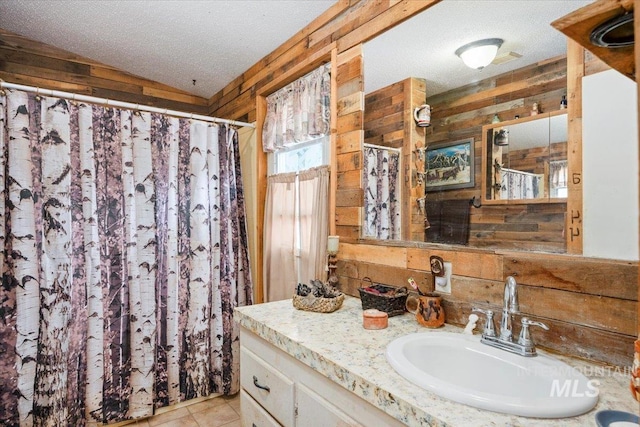103 W 420 N, Shoshone, ID 83352 - bathroom featuring wood walls, vanity, a textured ceiling, and a shower with shower curtain