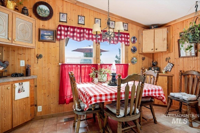103 W 420 N, Shoshone, ID 83352 - dining area with wooden walls, light tile patterned floors, and a chandelier