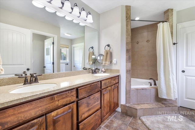 1021 Ballard Ln, Kimberly, ID 83341 - bathroom featuring double vanity, tile patterned flooring, and tiled shower / bath combo