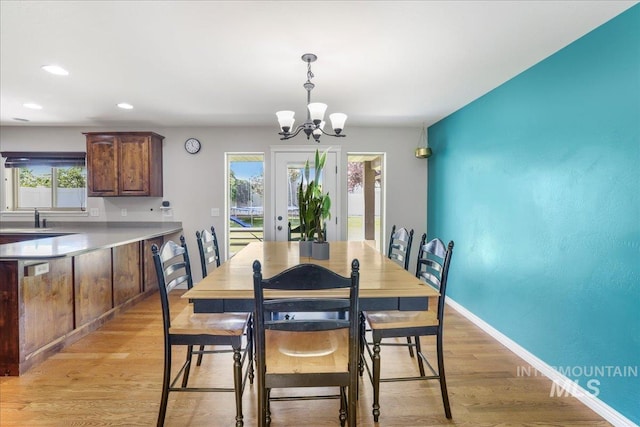 1021 Ballard Ln, Kimberly, ID 83341 - dining area featuring plenty of natural light, a chandelier, light wood-type flooring, and recessed lighting