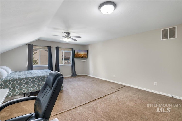 1021 Ballard Ln, Kimberly, ID 83341 - carpeted bedroom with vaulted ceiling and a ceiling fan